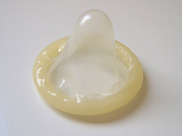 Opgerold condoom